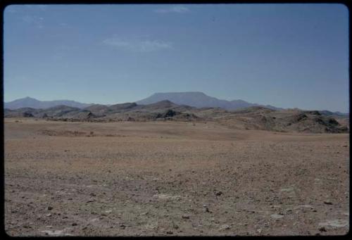 Landscape with mountains in the background