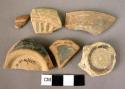 2 pottery rim sherds; 3 sherds; 3 base fragments - Classical ware