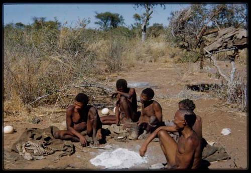 Groups: Men sitting with "Old Gau" at his dwelling place, including "Old ≠Toma," ≠Gao, "Old /Gaishay," and /Qui (Gau's son-in-law)