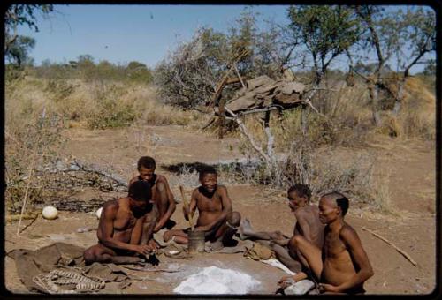 Groups: Men sitting with "Old Gau" at his dwelling place, including "Old ≠Toma," ≠Gao, "Old /Gaishay," and /Qui (Gau's son-in-law)