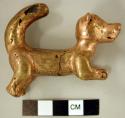Gold figure of dog