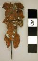 Human figure, articulated at neck.  Copper, very corroded.  Recently mounted on