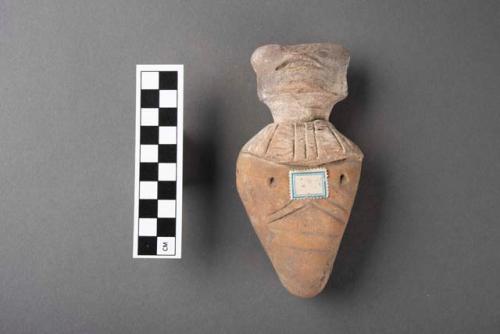 Body and part of head from a large joined pottery figurine