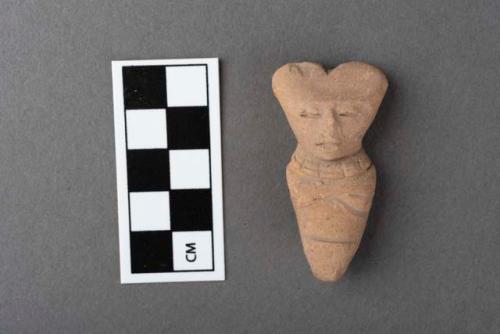 Head and body of joined pottery figurine