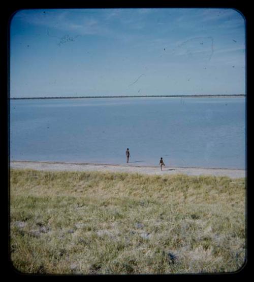 Two men in the water at Thinthuma Pan