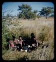 Group of women sitting at waterhole