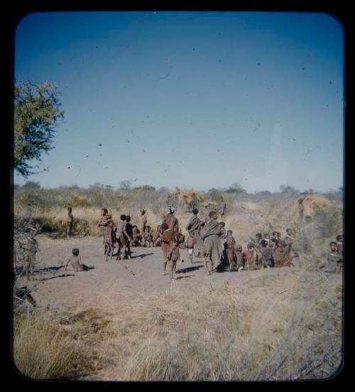 Group of people gathered for a curing dance