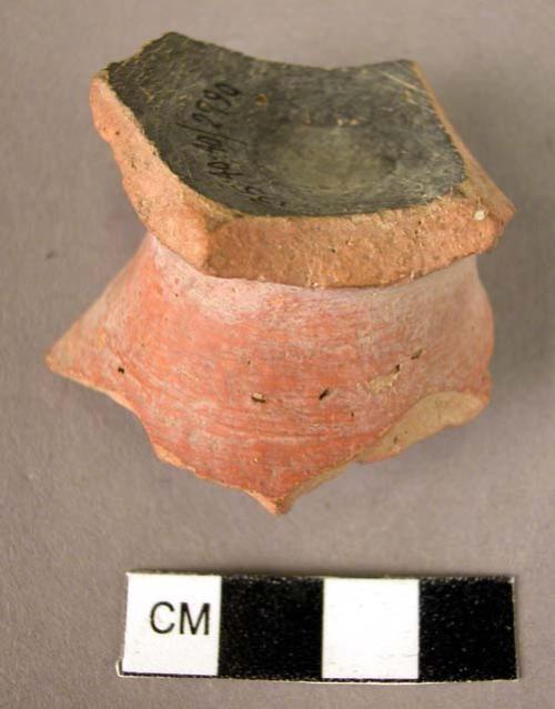 Pottery pedestal fragment - red slipped, black slip interior