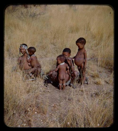 Women sitting with children [streaked]