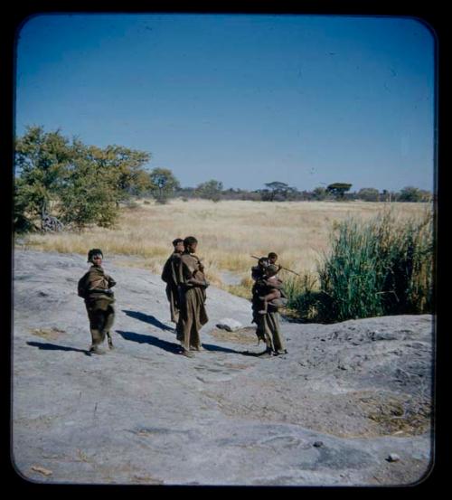 Group of boys gathered at waterhole