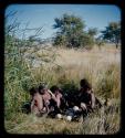 Group of women sitting at waterhole