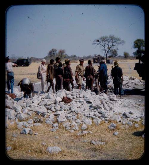 Expedition members and a group of people standing