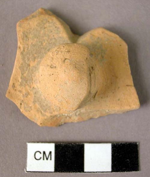 Plain ware fragment of cover with knobbed handle