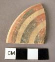 Pottery cylix foot with painted bands