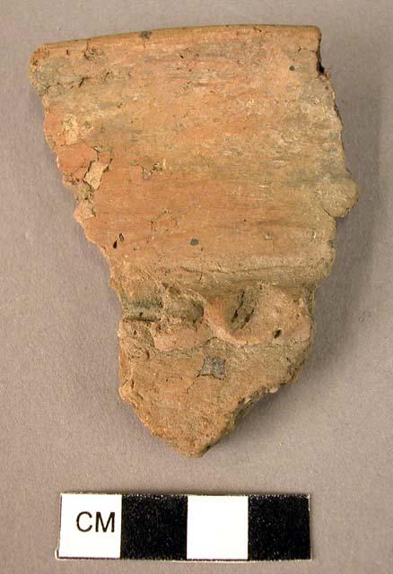 Rim potsherd - coarse red ware with plastic rope pattern