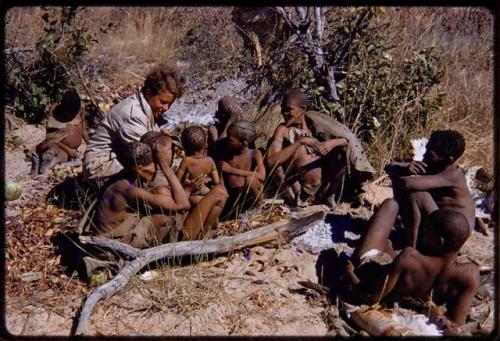 Elizabeth Marshall sitting with a group of people