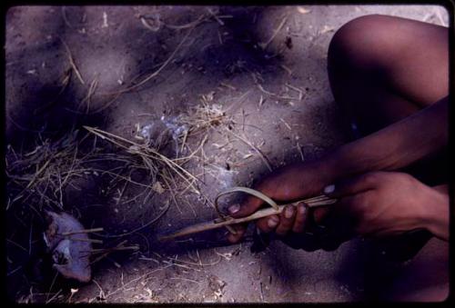 Someone's hands holding a handmade toy gun