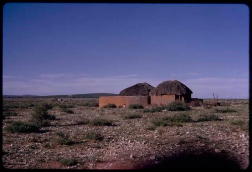 Two houses, seen at a distance