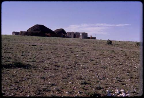 Two houses, seen at a distance