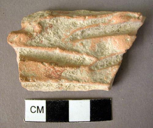 Potsherd - deep interior scorings reminiscent of similar bowls for rice washing