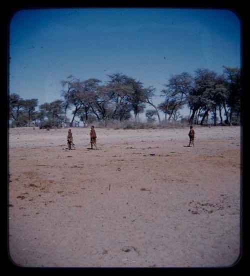 Three people walking