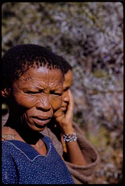 Woman standing, close-up