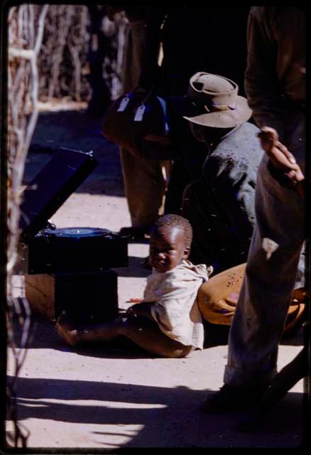 Boys and his son beside a gramophone