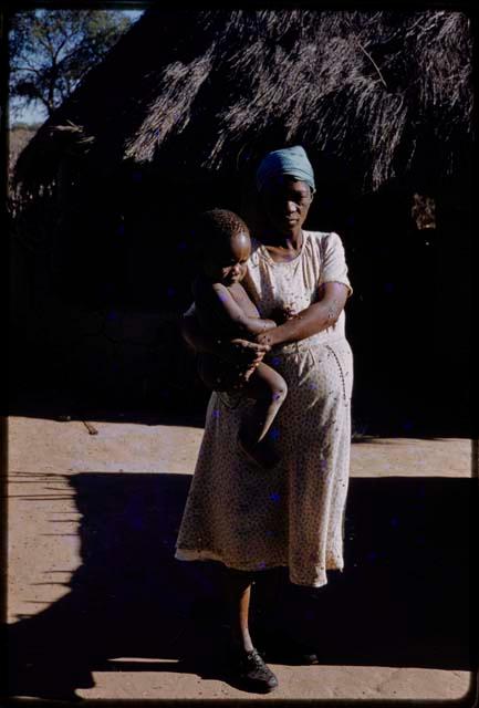 Boys' wife holding her child