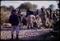 Group of people receiving rations