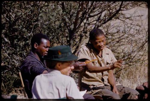 Lorna Marshall, Kernel Ledimo, and Dabe interviewing people