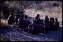 Group of people sitting at Marshall Expedition camp