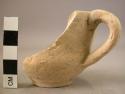 Pottery cup fragment with careless handle attachment