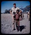 "Physical Type": Man and Charles O. Handlley Jr. standing, showing height difference