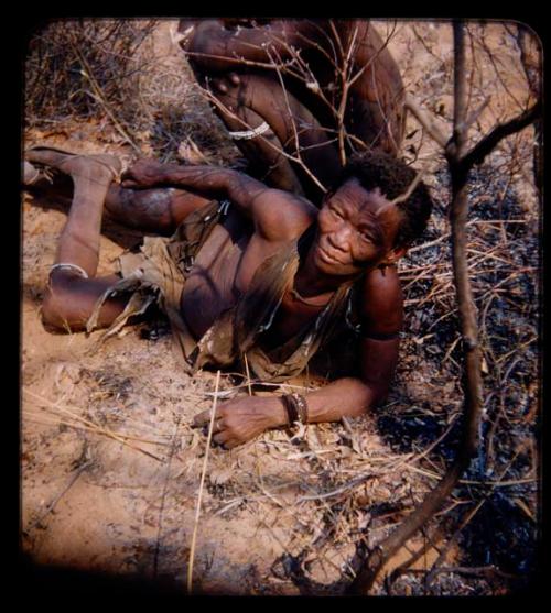 Portraits: Man lying on ground