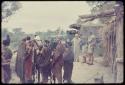 Expedition members, including Laurence Marshall, arriving at Tsumkwe, with a group of people present