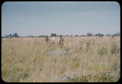 Three men walking