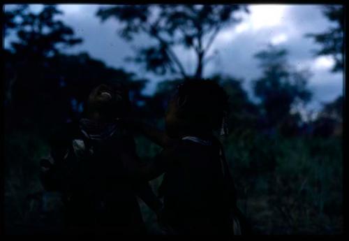 Two girls playing; one is the daughter of Hxua//a (one of Gaou's wives)