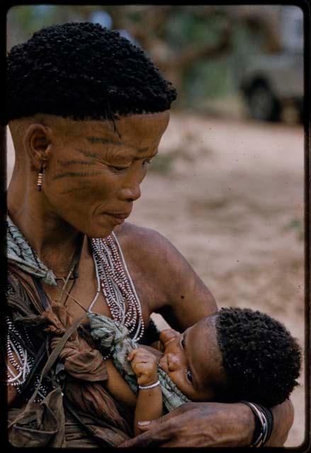 Woman nursing a baby