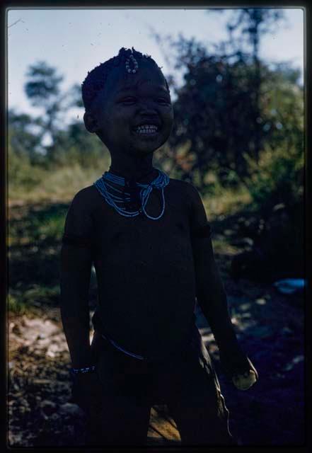 Girl (daughter of Hxua//a) standing