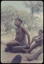 Tsamgao (≠Toma's son) sitting on a jerry can