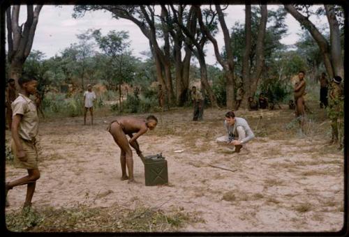 Group of people playing a cricket game