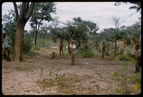 Group of people playing a cricket game