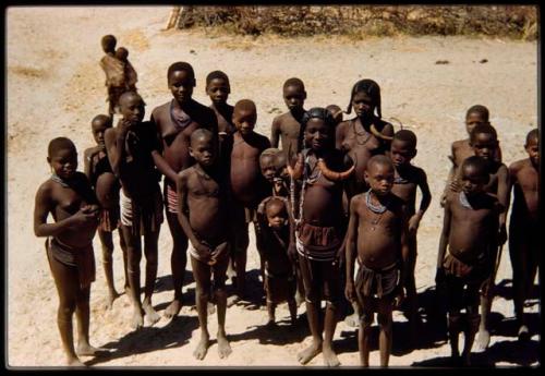 Group of people standing, view from the top of the expedition truck