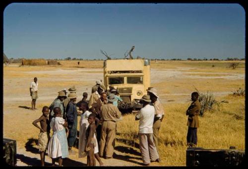 People standing next to Merl La Voy's van