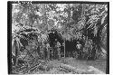 Men eating at workmen's camp