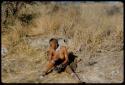 Bathing: !Ungka (//Kushay's sister, daughter of "Old Gau") washing herself with water from an Ovambo pot