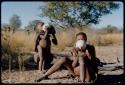 Children, Eating: Two young people and a child drinking from ostrich egg shells