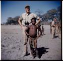 Physical Type: Man from Gam standing with Charles Handley (half of stereoview 2001.29.5958)