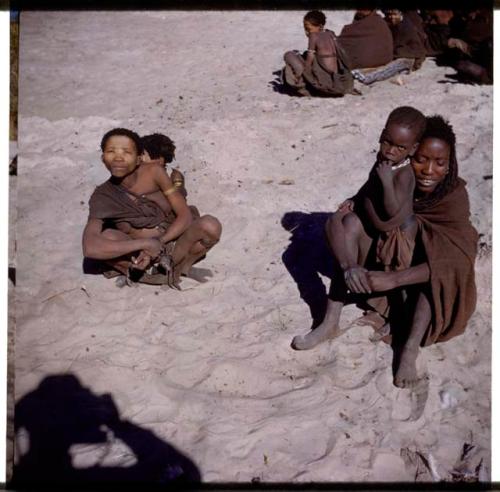 Physical Type: Woman from Muremi's group holding a child, sitting with another woman who is holding a child (half of stereoview 2001.29.12121)