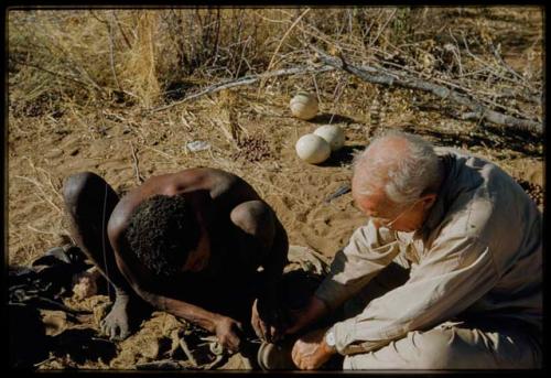 Expedition, Personnel: "Old Gau" sewing the sole on Laurence Marshall's shoe, close-up